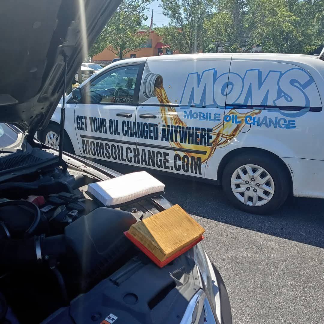 A new air filter next to the dirty one it replaced.